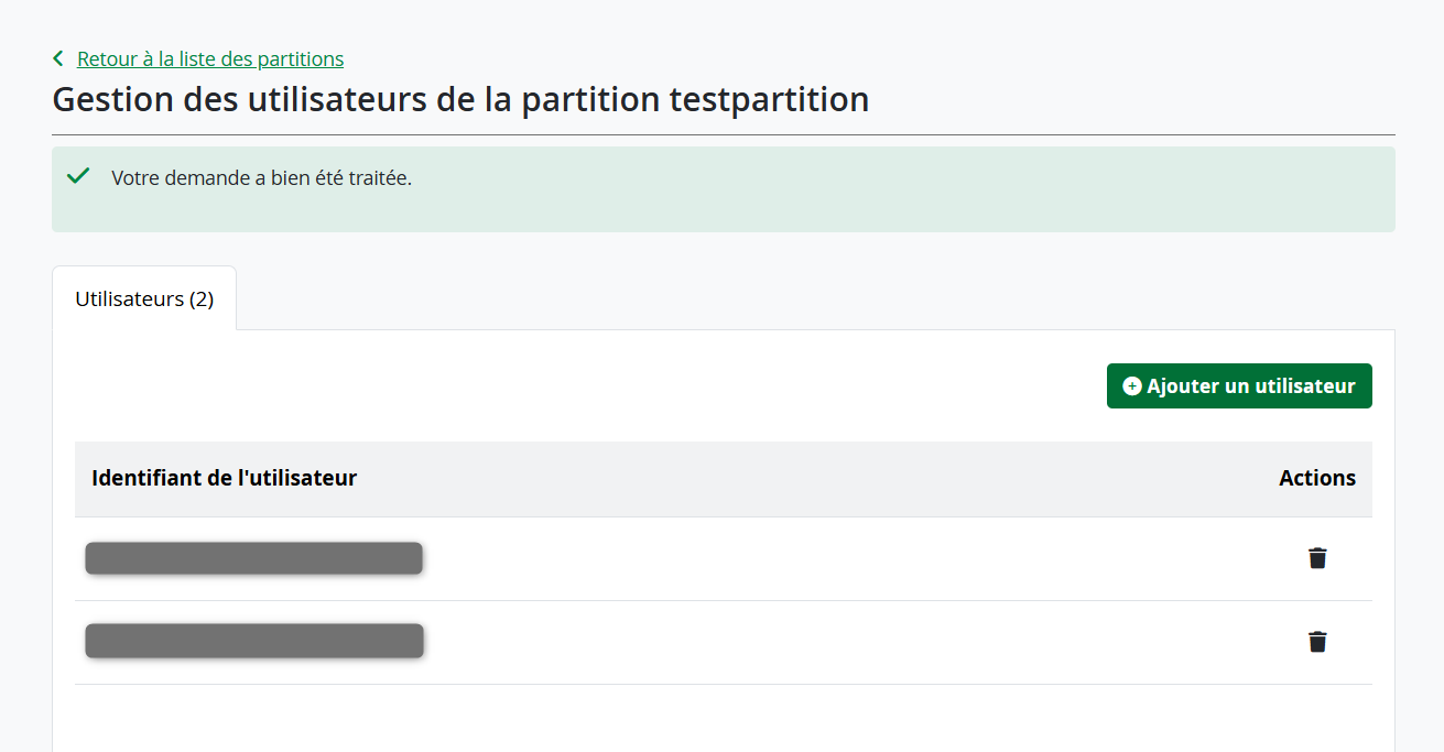 User management interface for partition "testpartition" list of users The interface includes a confirmation message for a successful request, a green button to add a user, and trash icons for deleting users.